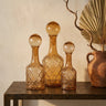 Cianna Brown glass bottle round with bal S