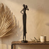 Rafah Black poly woman statue holding pot shoulder