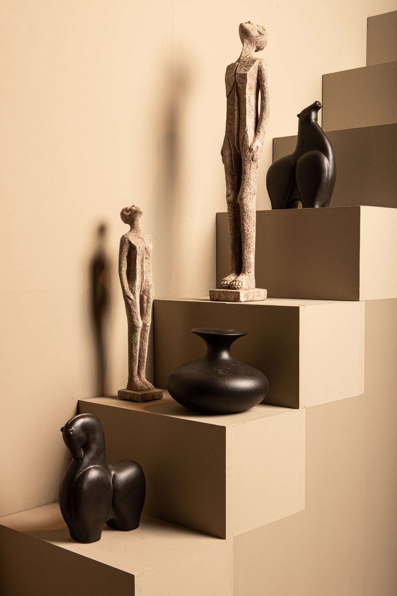 Keiton Grey human shaped statue low
