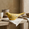 Gracella Yellow mango wood bird statue L