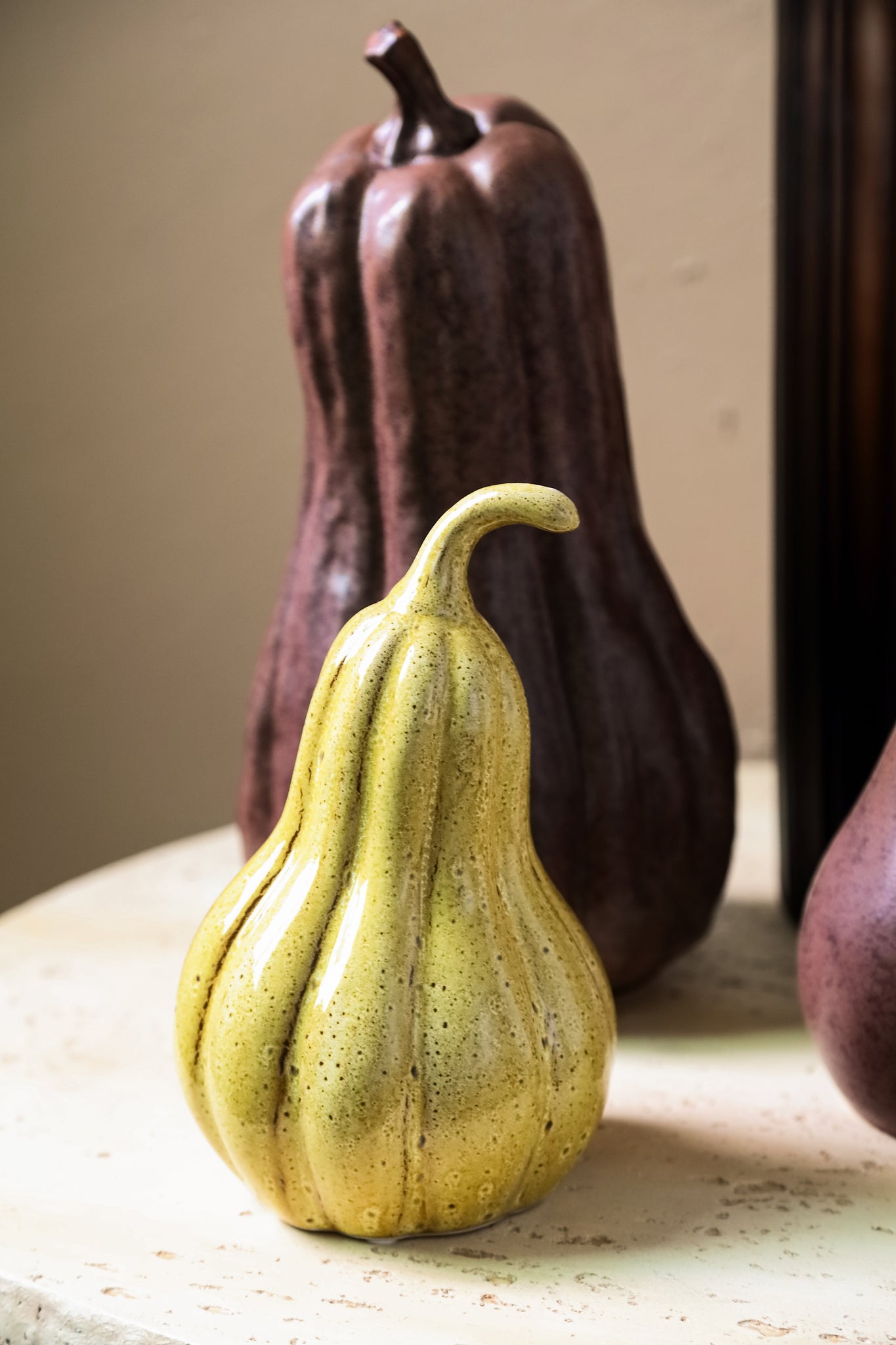 Julija Yellow ceramic pumpkin shaped statue low