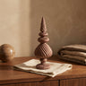 Diala Brown cement statue swirl pattern