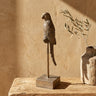 Christianne Gold poly parrot statue on cream base