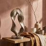Innar Gold casted alu open oval wave statue