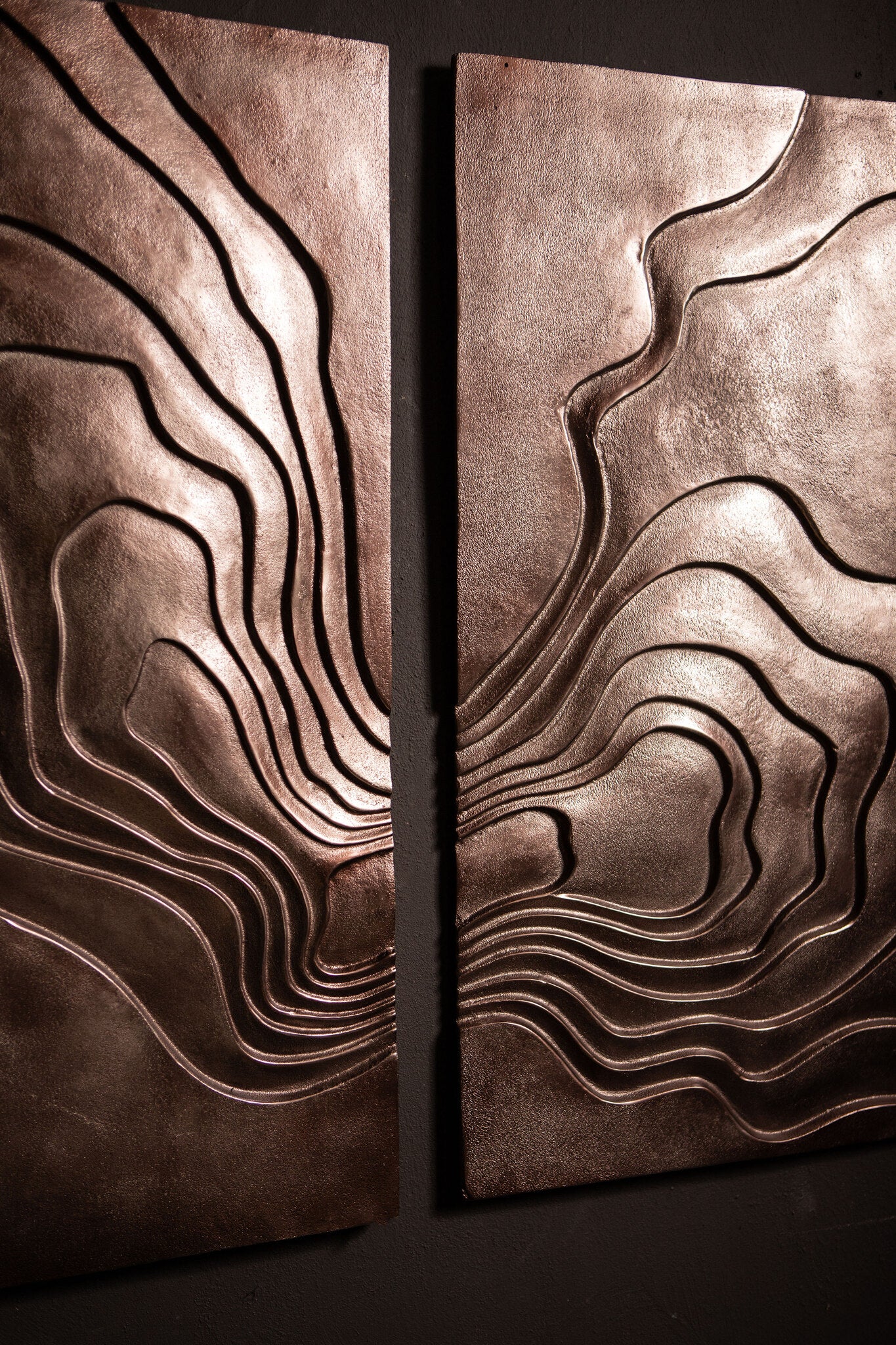Erike Bronze casted alu wall panel wave in 2 parts