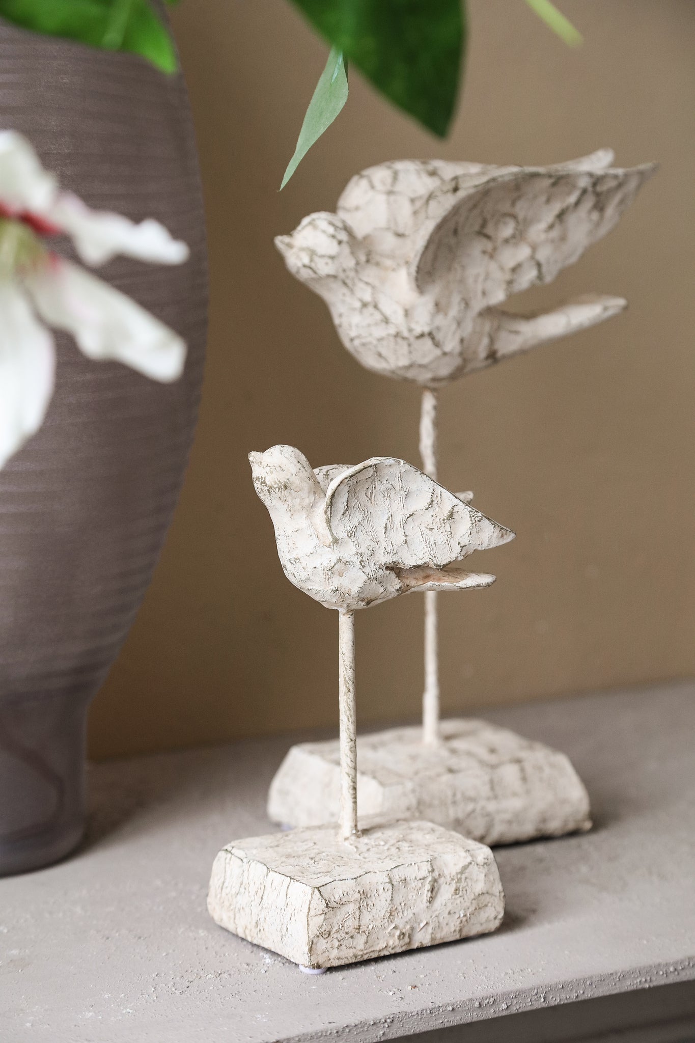 Naura Cream bird shaped cement statue on base S
