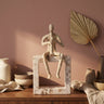 Aleria Beige casted alu trumpet man on marble base